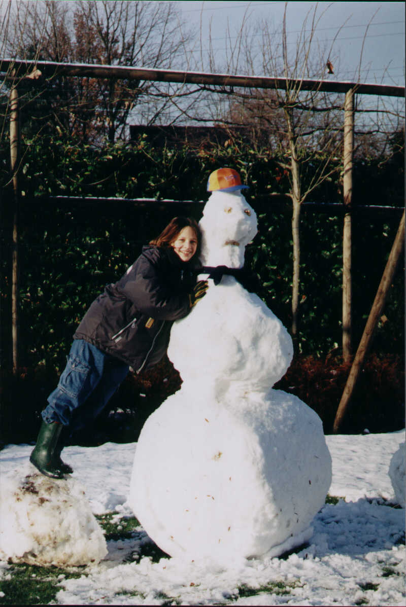 A mother playing with children; Actual size=180 pixels wide